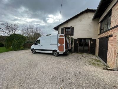 Gentlevan's staff loading furniture